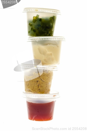 Image of Stack of condiment containers