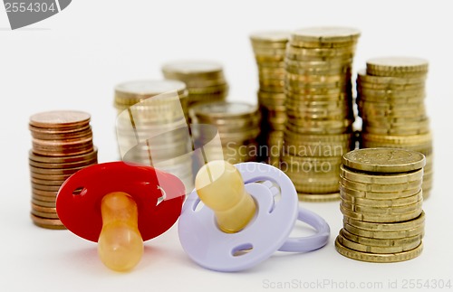 Image of pacifier with hard money