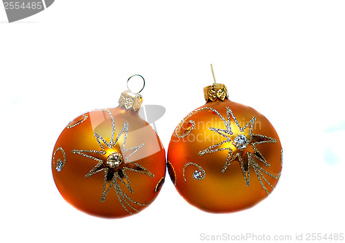 Image of Two orange Christmas ball with golden pattern