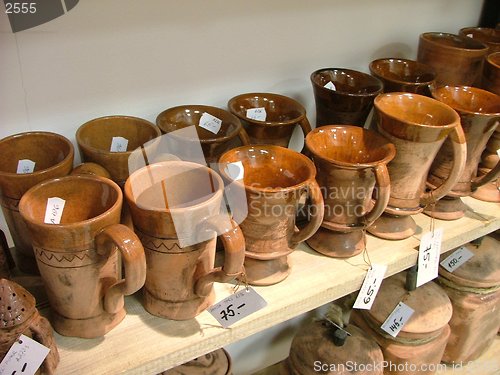 Image of shelf of ceramical mugs
