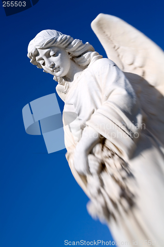 Image of angel against blue sky