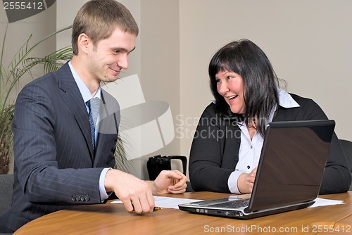 Image of Businesspeople working in office