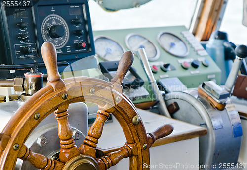 Image of Steering wheel of an old sailing vessel, close up