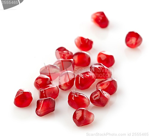 Image of pomegranate seeds on a white background