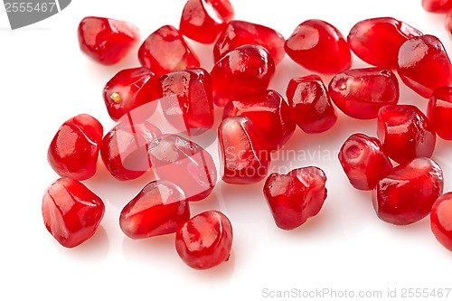 Image of pomegranate seeds on a white background