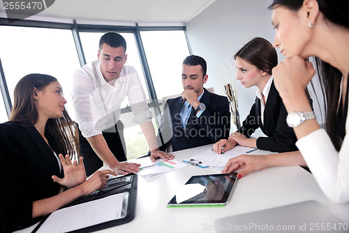 Image of business people group in a meeting at office
