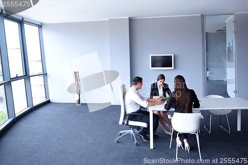 Image of business people group in a meeting at office