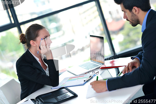 Image of business people group in a meeting at office