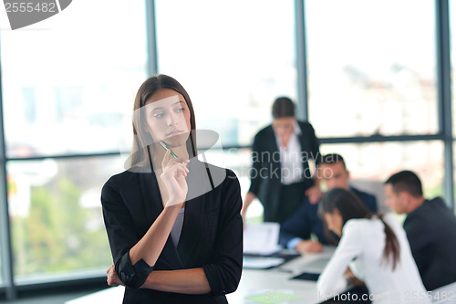 Image of business people group in a meeting at office