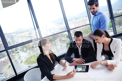 Image of business people group in a meeting at office