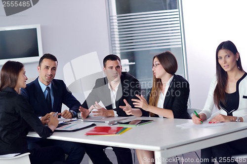 Image of business people group in a meeting at office