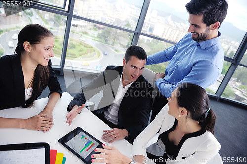 Image of business people group in a meeting at office