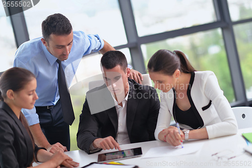 Image of business people group in a meeting at office