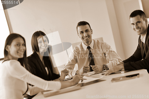 Image of business people group in a meeting at office