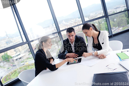 Image of business people group in a meeting at office