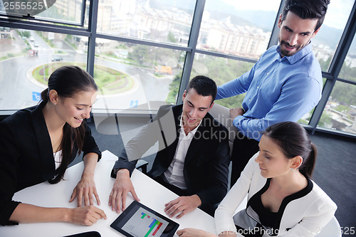 Image of business people group in a meeting at office