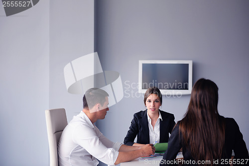 Image of business people group in a meeting at office