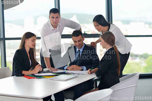 Image of business people group in a meeting at office