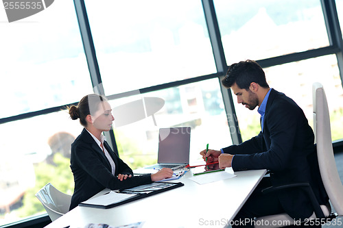 Image of business people group in a meeting at office