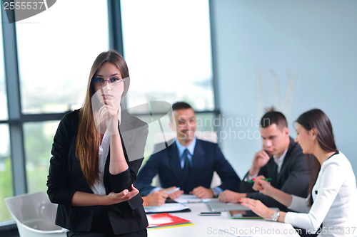 Image of business people group in a meeting at office