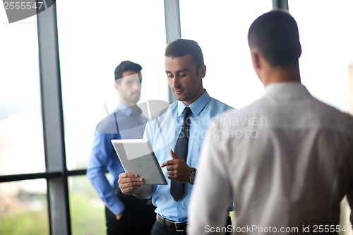 Image of business people group in a meeting at office