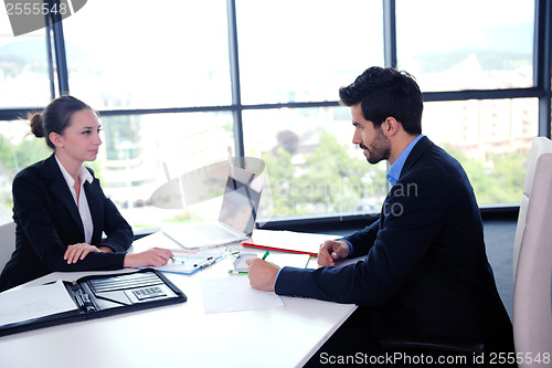 Image of business people group in a meeting at office