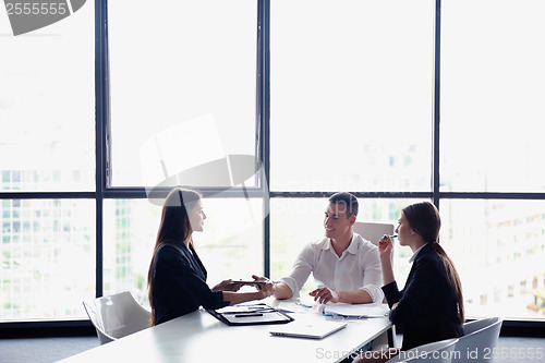 Image of business people group in a meeting at office