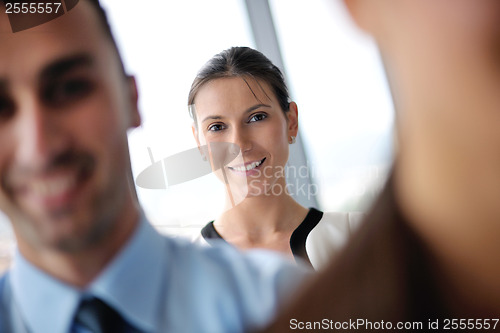 Image of business people group in a meeting at office