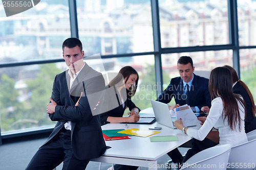 Image of business people group in a meeting at office