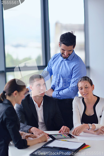 Image of business people group in a meeting at office