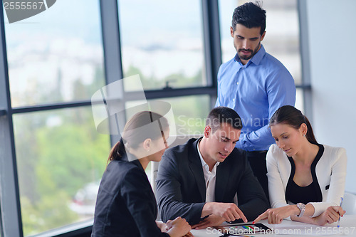 Image of business people group in a meeting at office