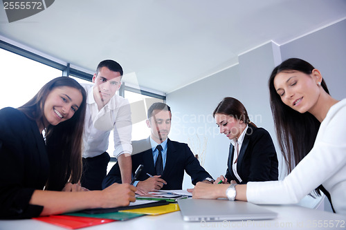 Image of business people group in a meeting at office