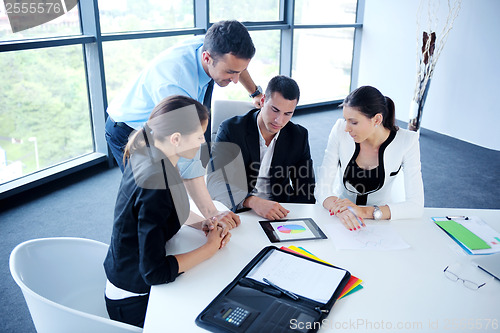Image of business people group in a meeting at office