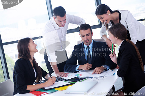 Image of business people group in a meeting at office