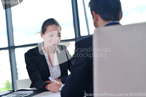 Image of business people group in a meeting at office