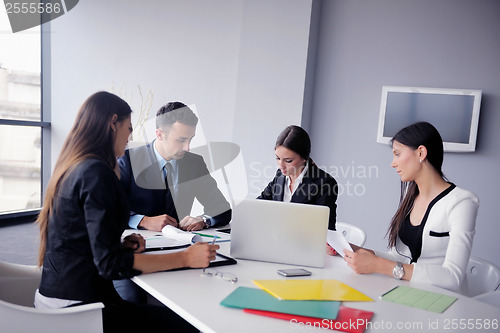 Image of business people group in a meeting at office