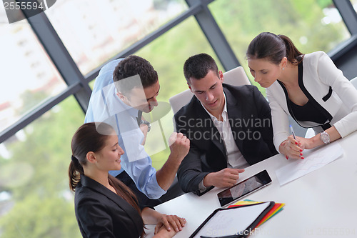 Image of business people group in a meeting at office
