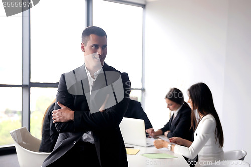 Image of business people group in a meeting at office