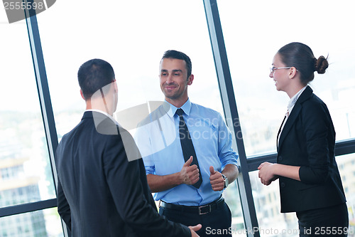Image of business people group in a meeting at office