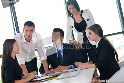 Image of business people group in a meeting at office