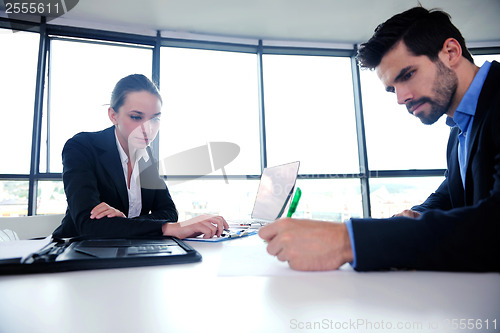 Image of business people group in a meeting at office