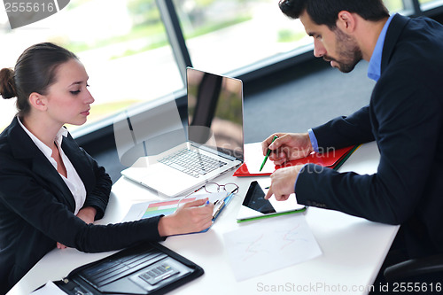 Image of business people group in a meeting at office