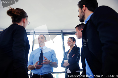 Image of business people group in a meeting at office