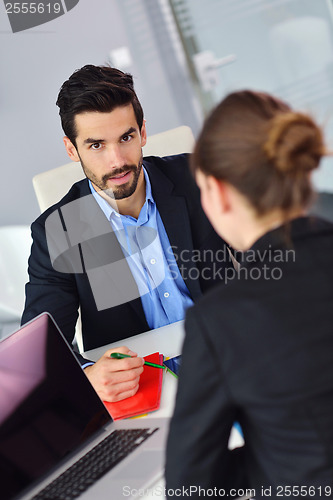 Image of business people group in a meeting at office