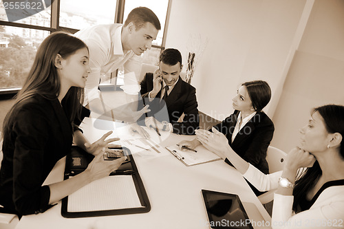 Image of business people group in a meeting at office