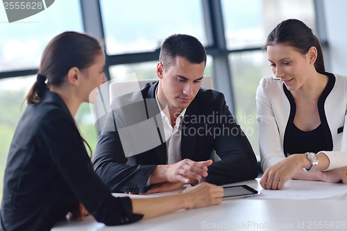 Image of business people group in a meeting at office
