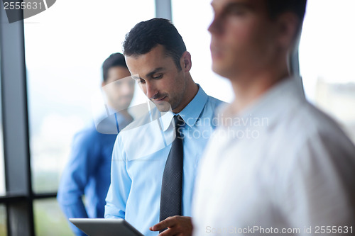 Image of business people group in a meeting at office