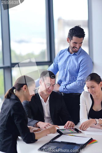 Image of business people group in a meeting at office