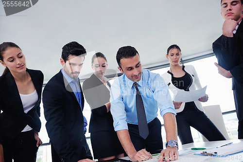 Image of business people group in a meeting at office