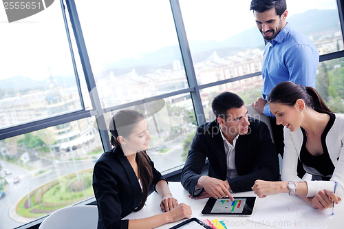 Image of business people group in a meeting at office